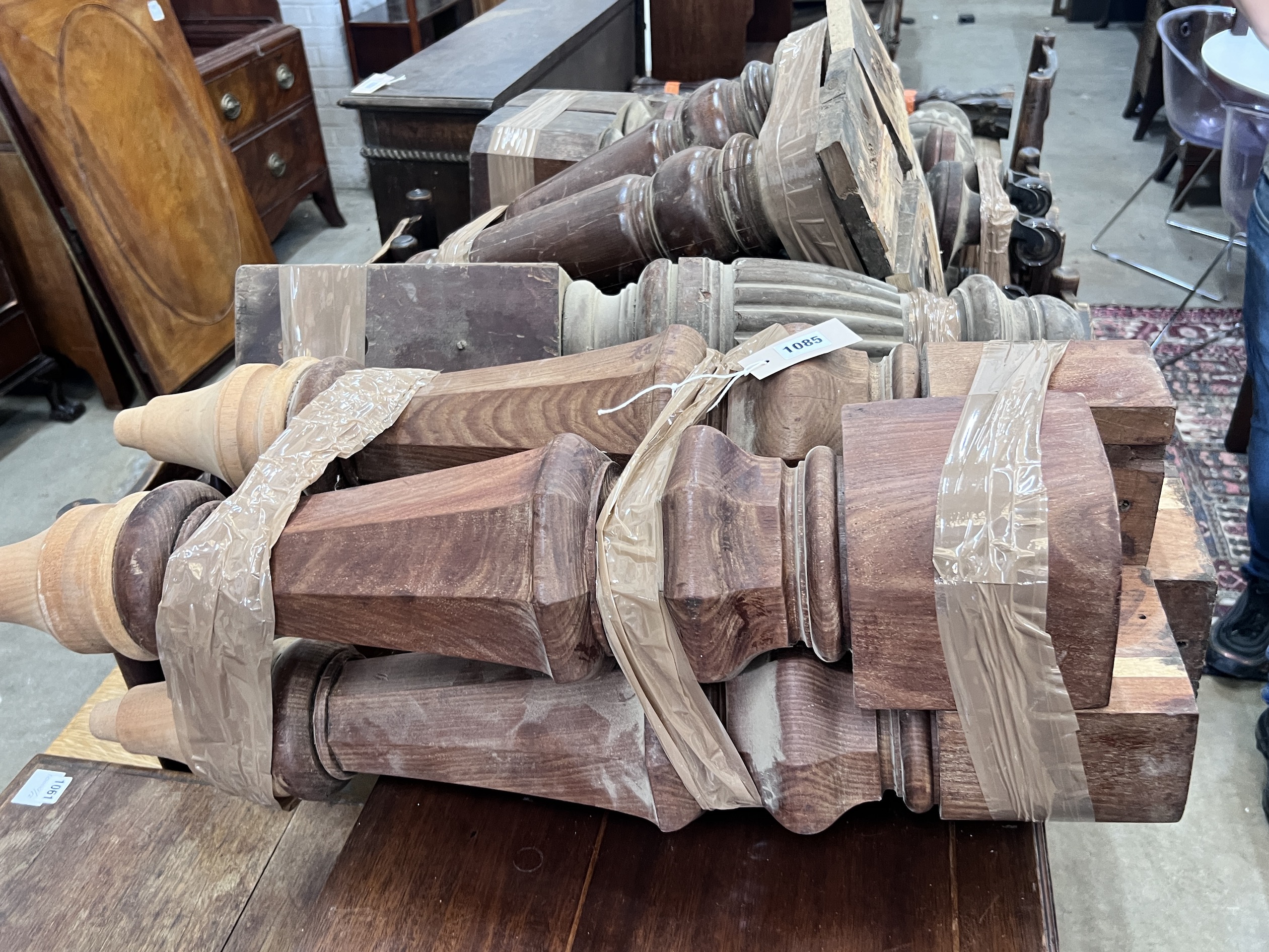 Seven sets of Victorian and later mahogany table legs, tallest 79cm